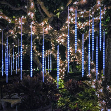blue meteor lights wrapped around tree